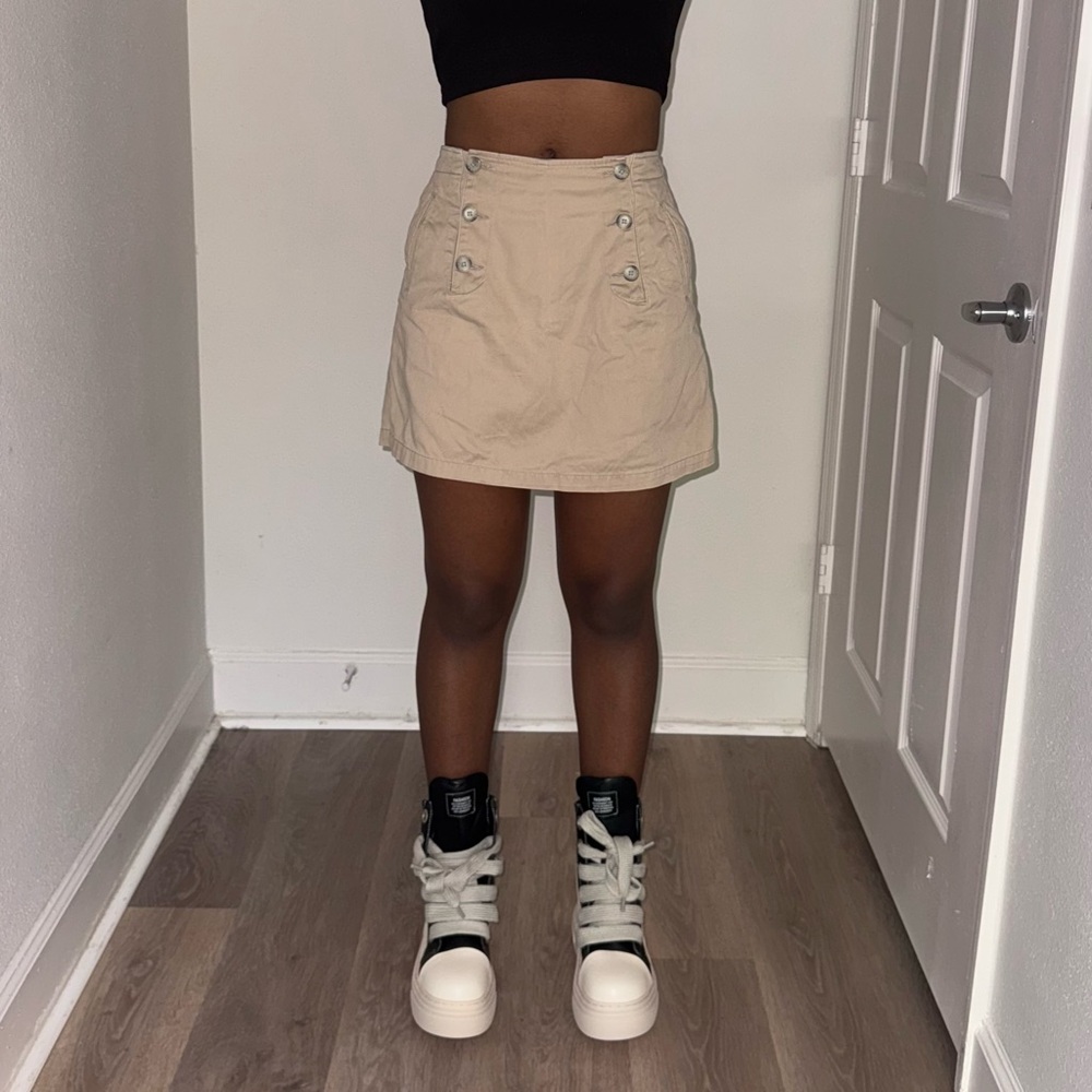 tan button-front mini skirt